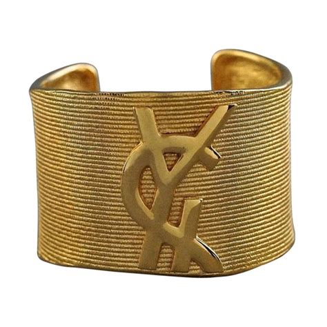 saint laurent golden ysl logo cuff bracelet|ysl cuff bracelets.